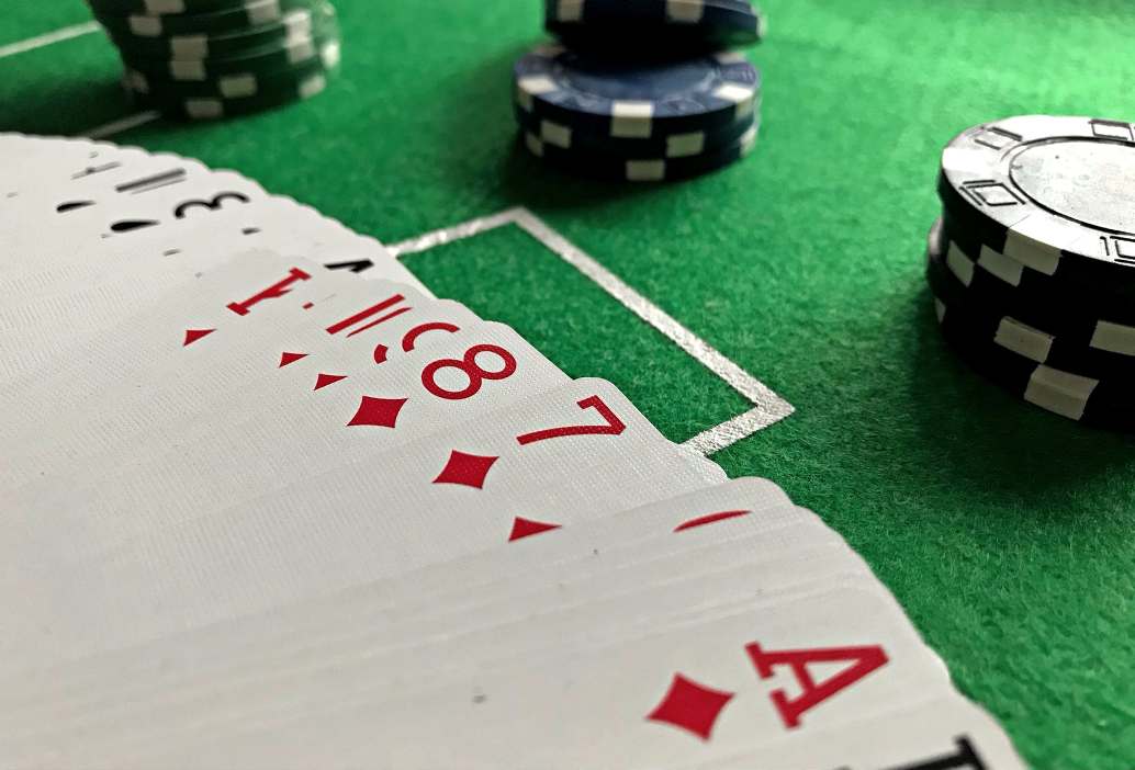 Playing cards with poker chips